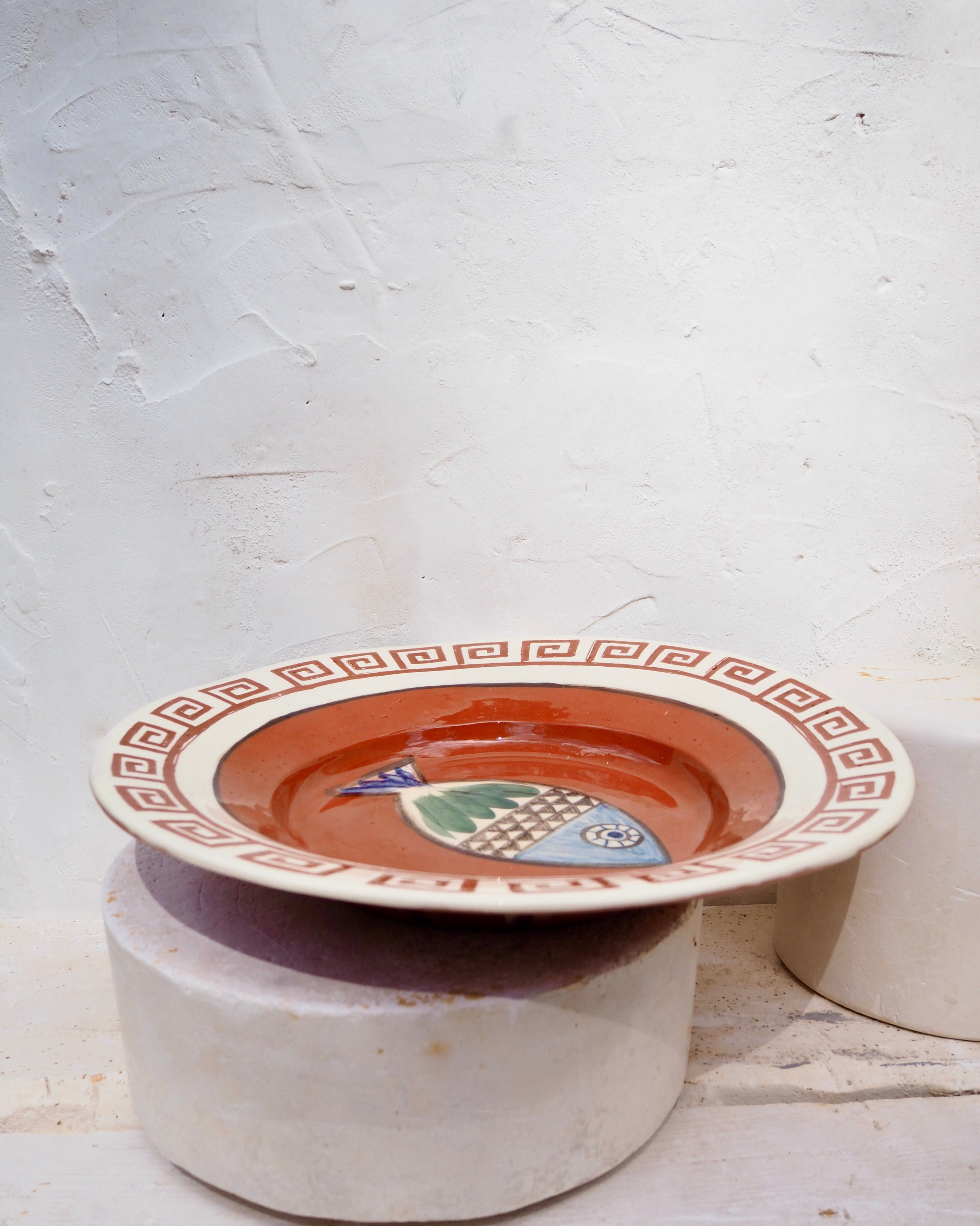 Etruscan Wall Charger - Carved border and fish design with brass wall hook