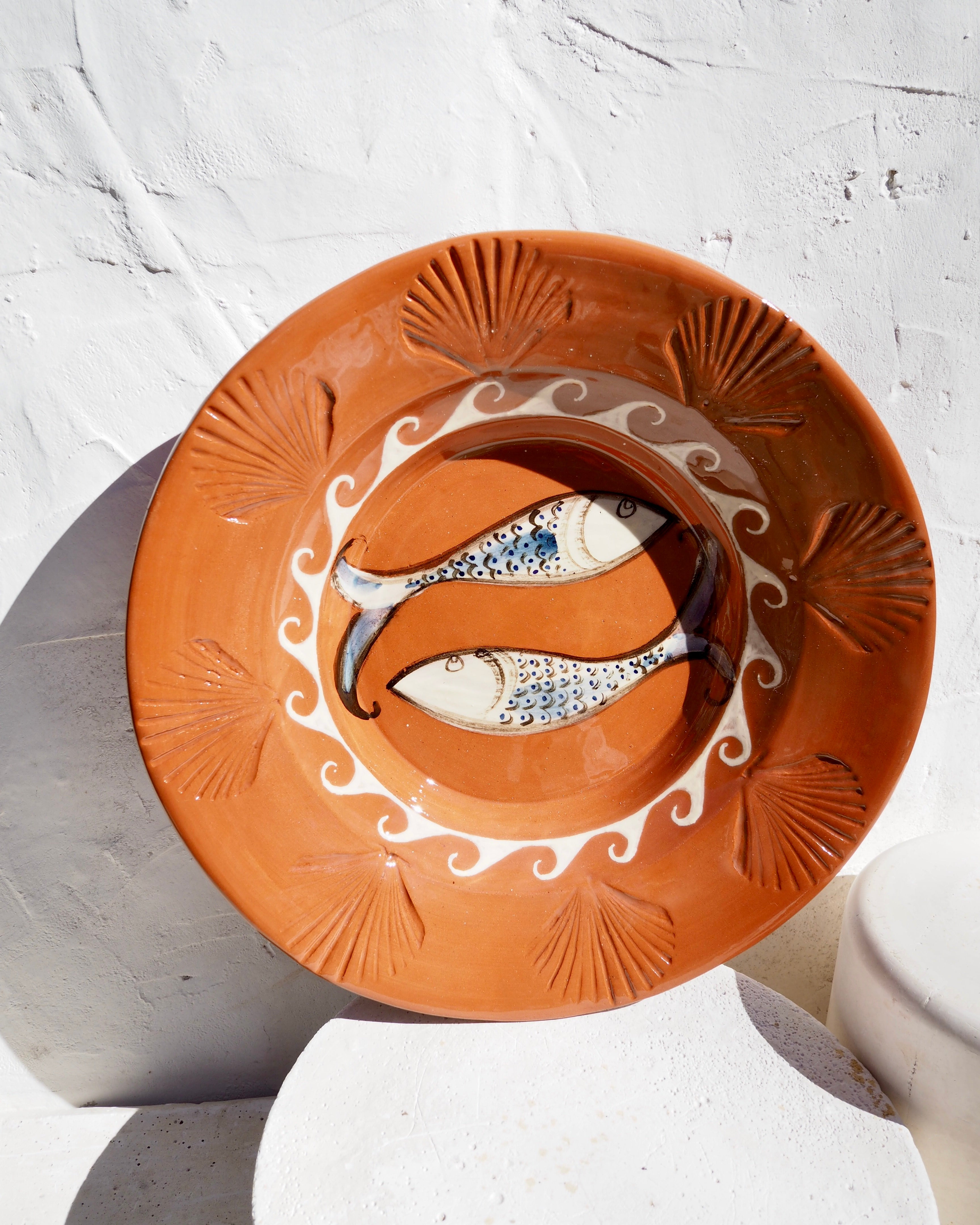Etruscan Wall Charger Plate - embossed shell border with fish design