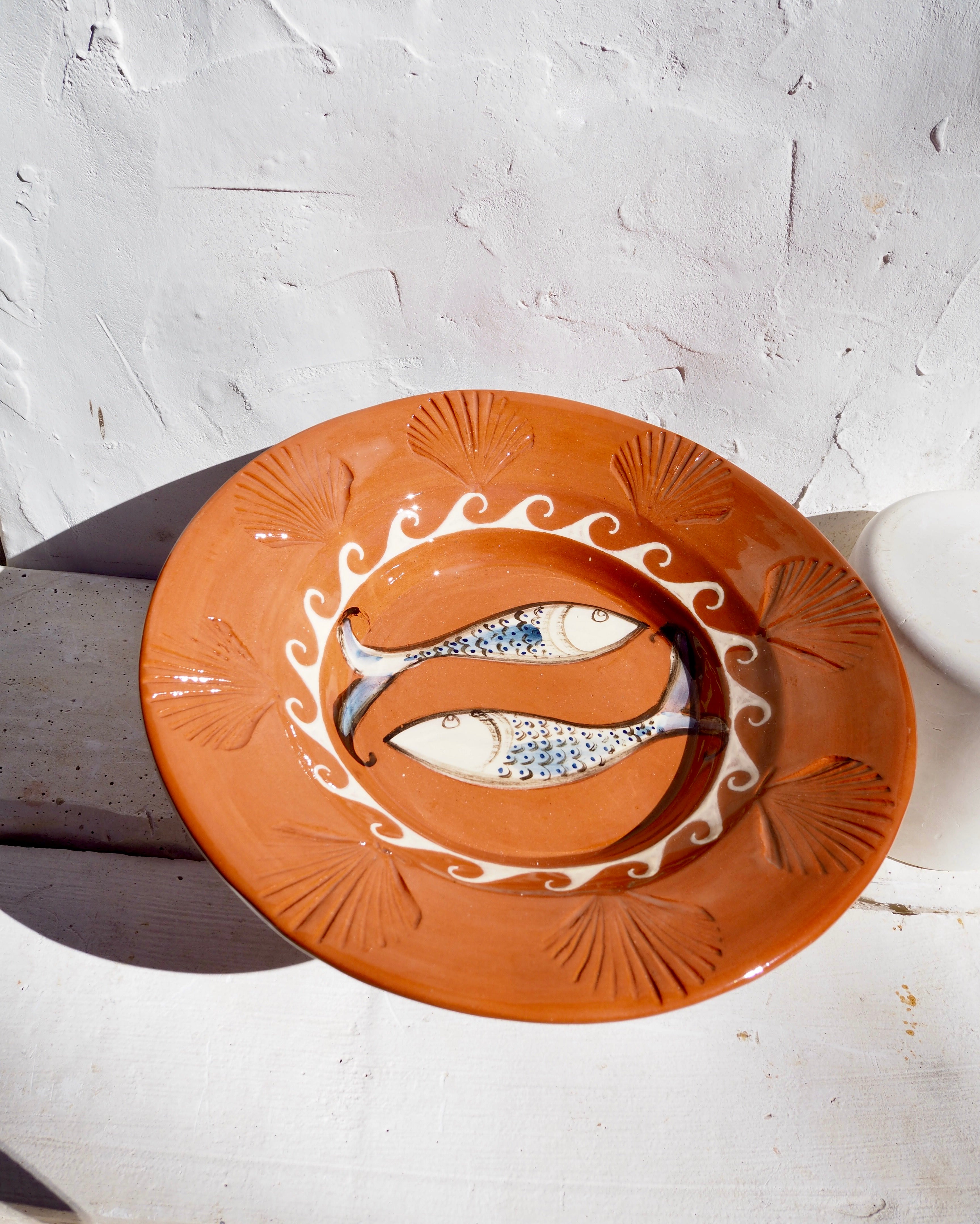 Etruscan Wall Charger Plate - embossed shell border with fish design