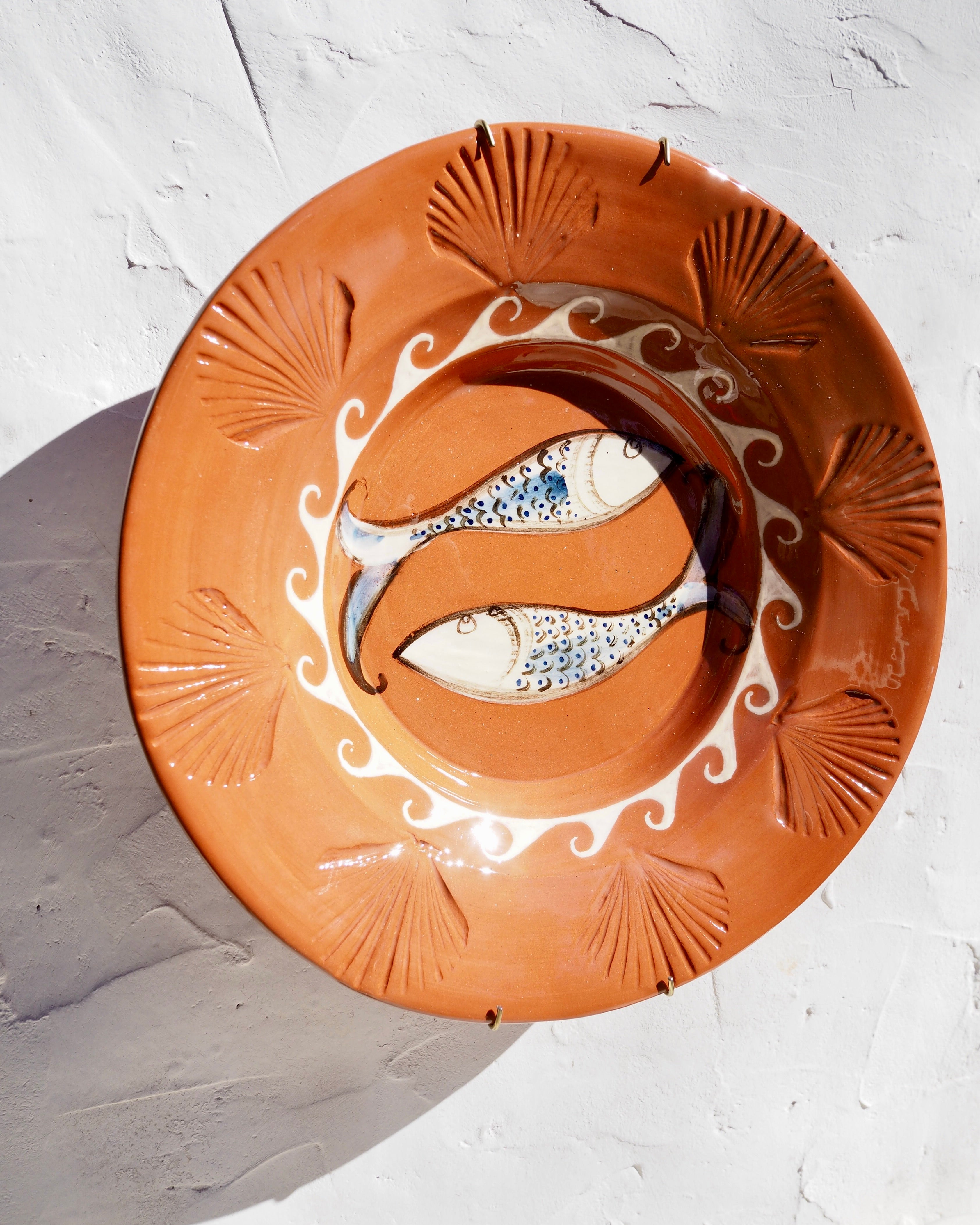 Etruscan Wall Charger Plate - embossed shell border with fish design