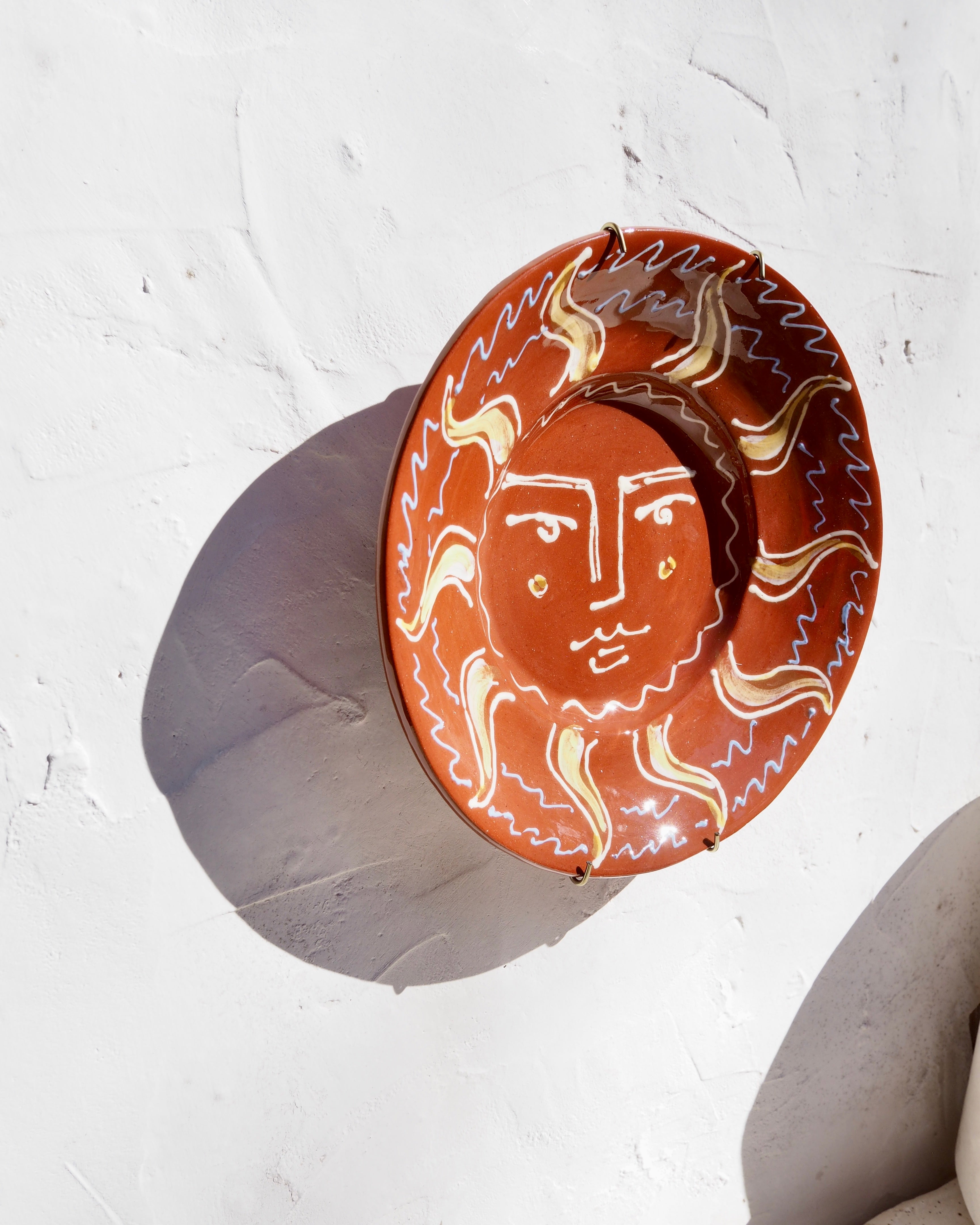 Puglia Plate - Slip trail designed Il sole face with brass wall hook