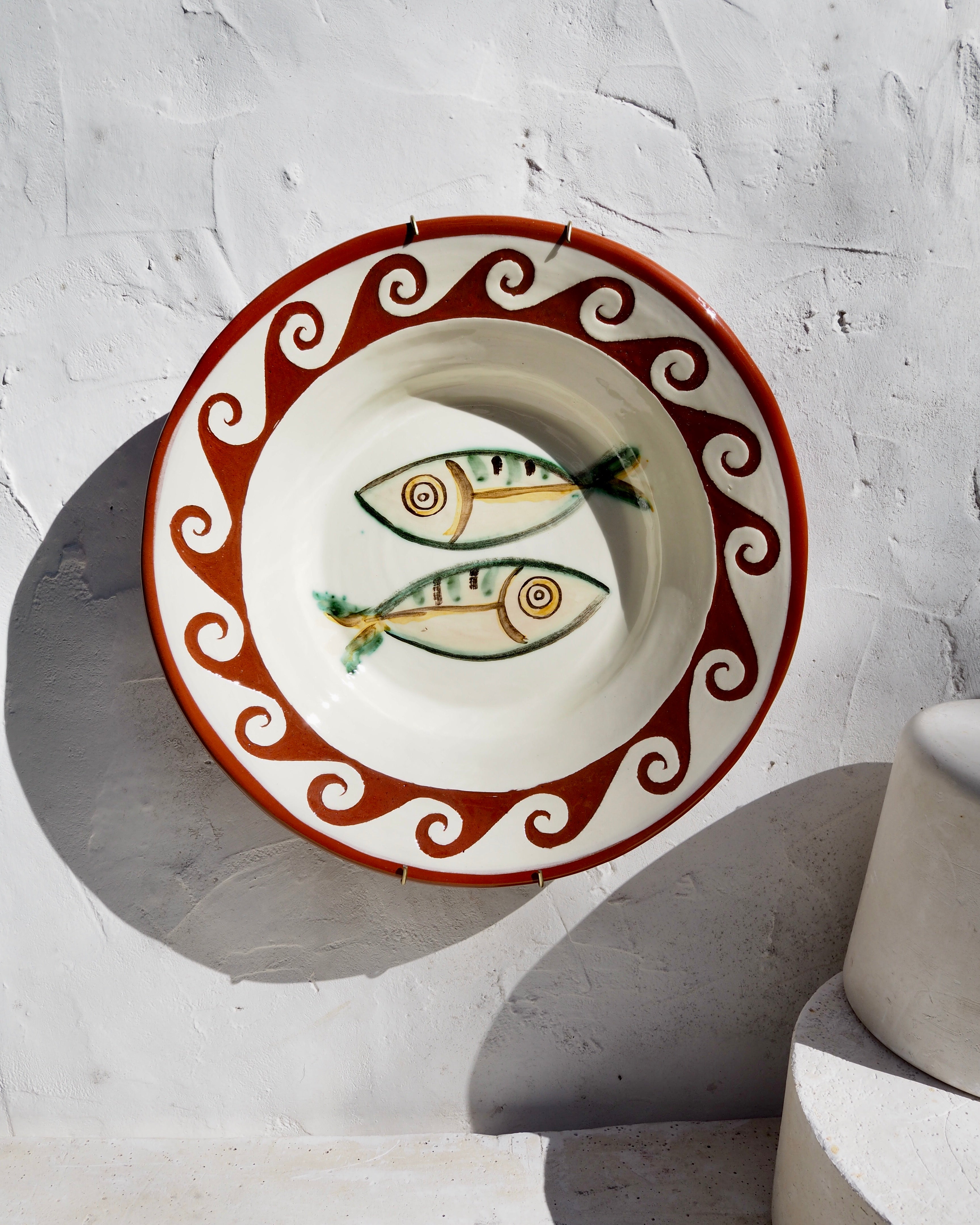 Etruscan Wall Charger Plate - Carved wave border with fish design
