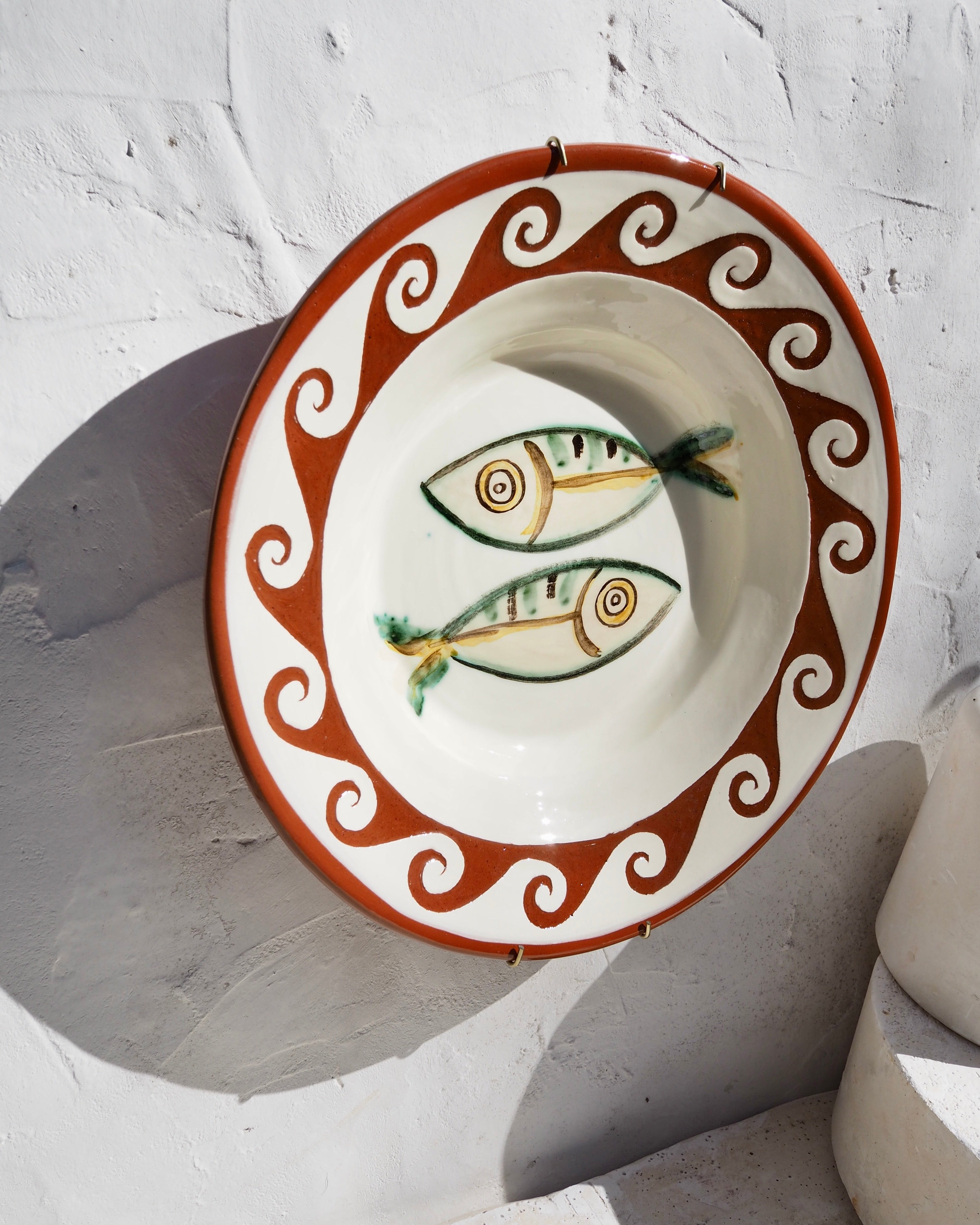 Etruscan Wall Charger Plate - Carved wave border with fish design
