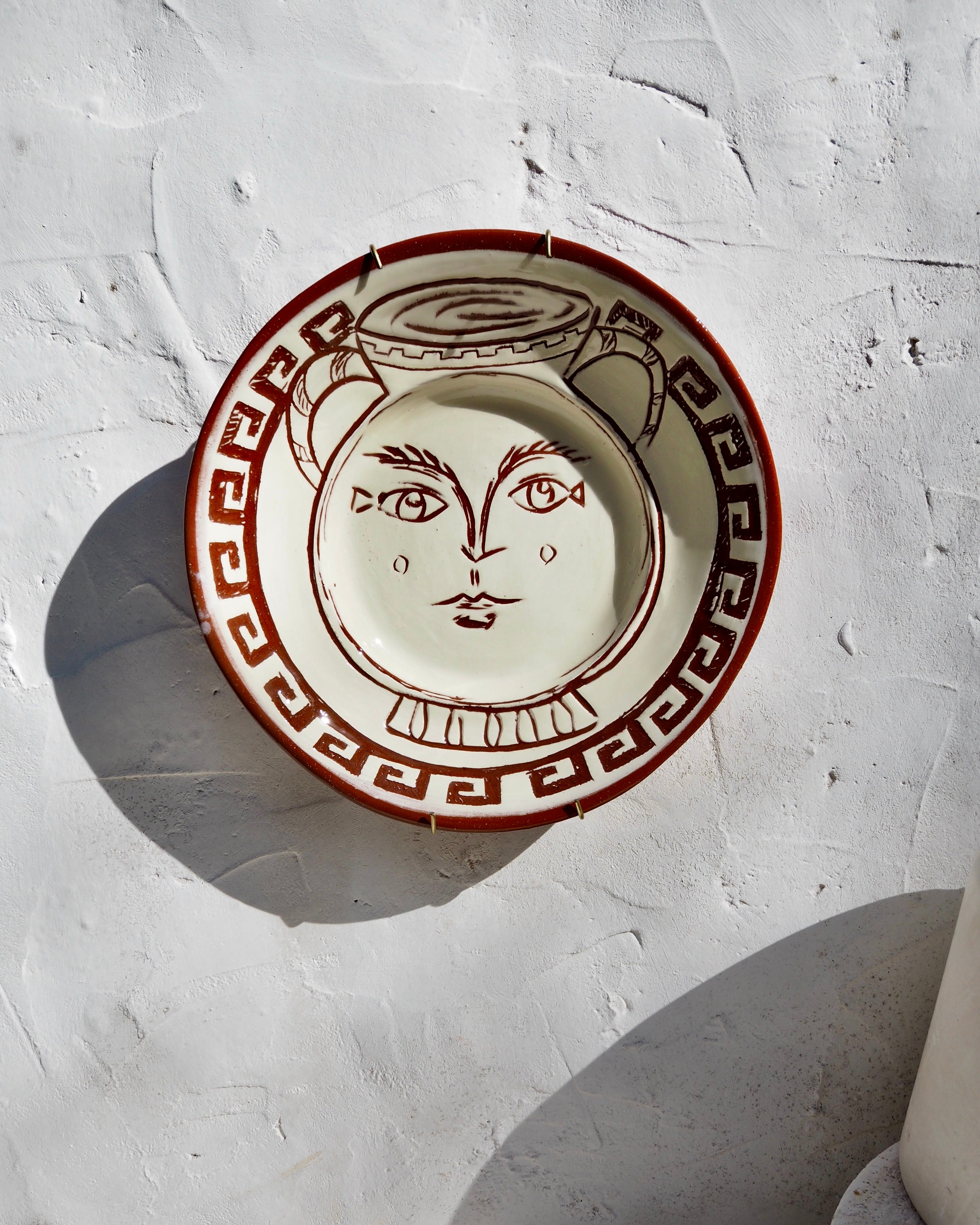 Puglia Plate - Carved Etruscan urn with border detail and brass wall hook