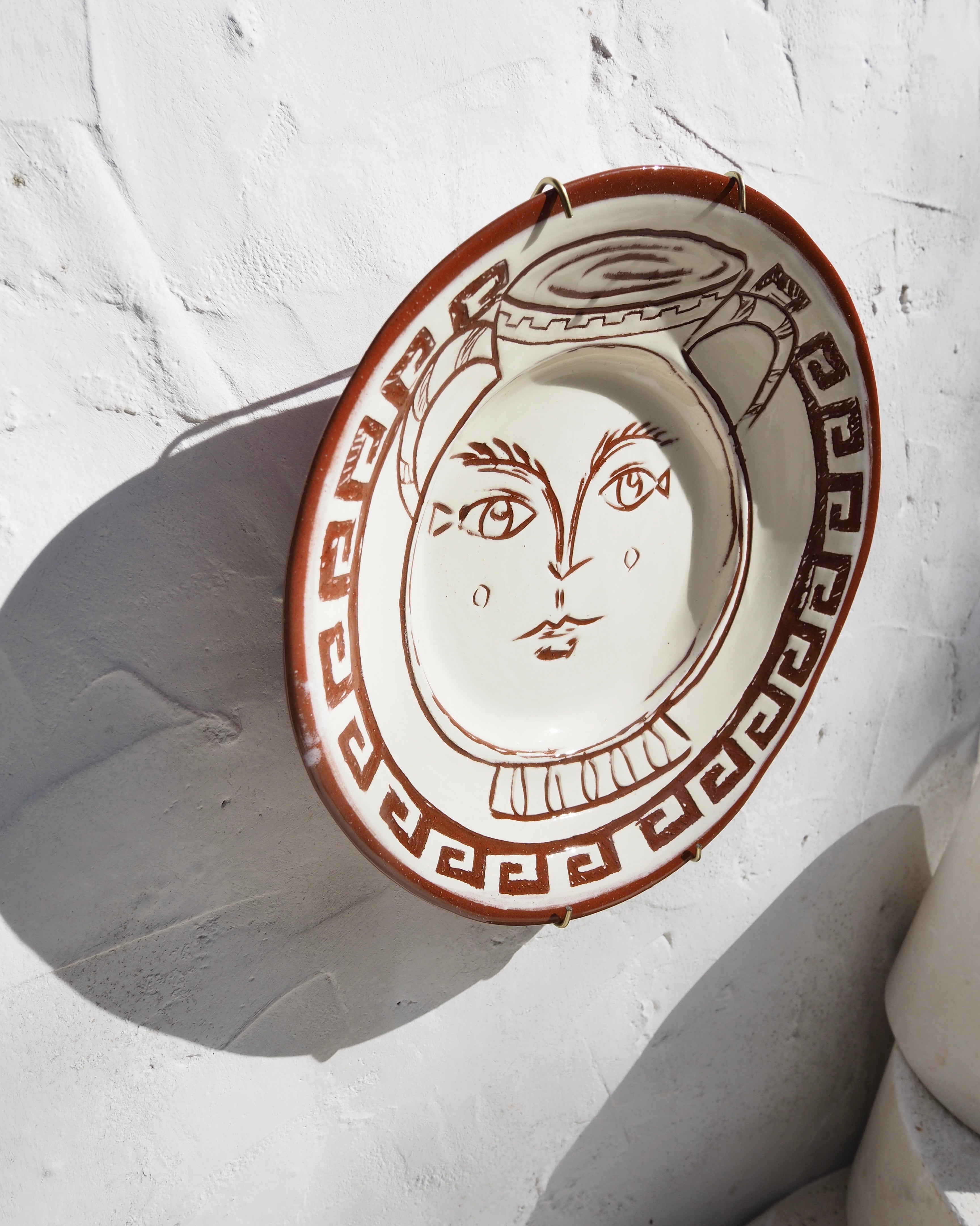 Puglia Plate - Carved Etruscan urn with border detail and brass wall hook