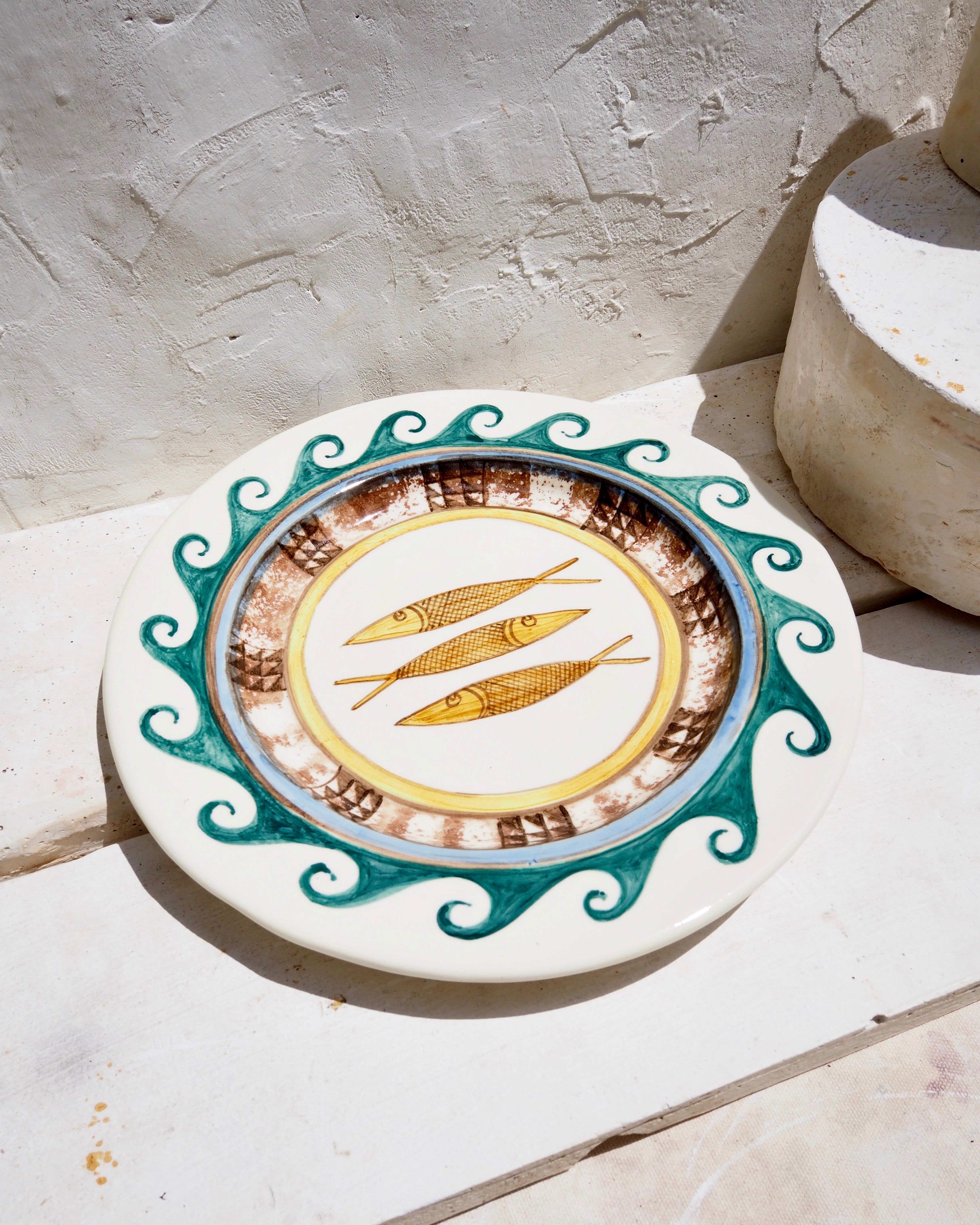 Plate with green wave design