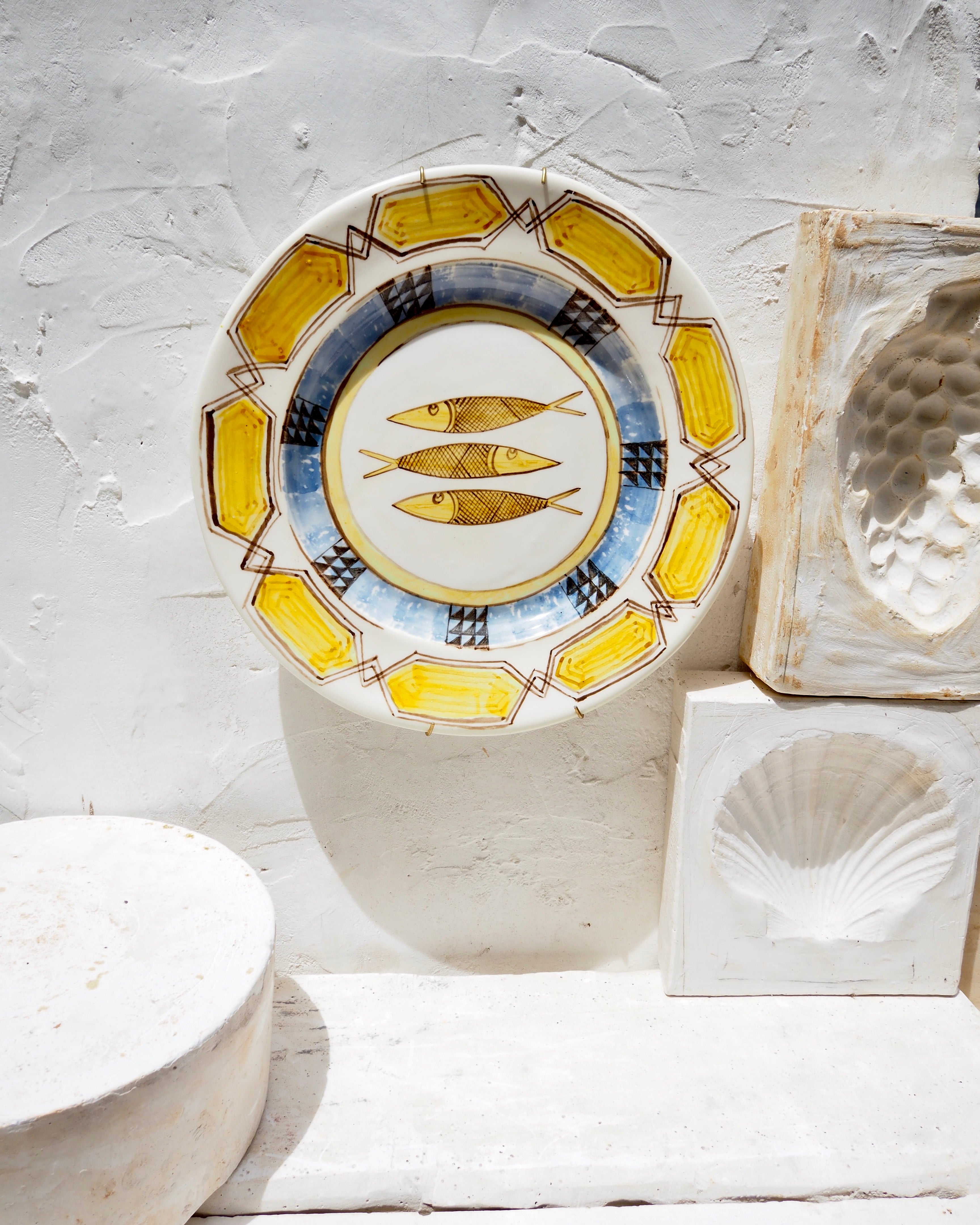 Plate with yellow tile border