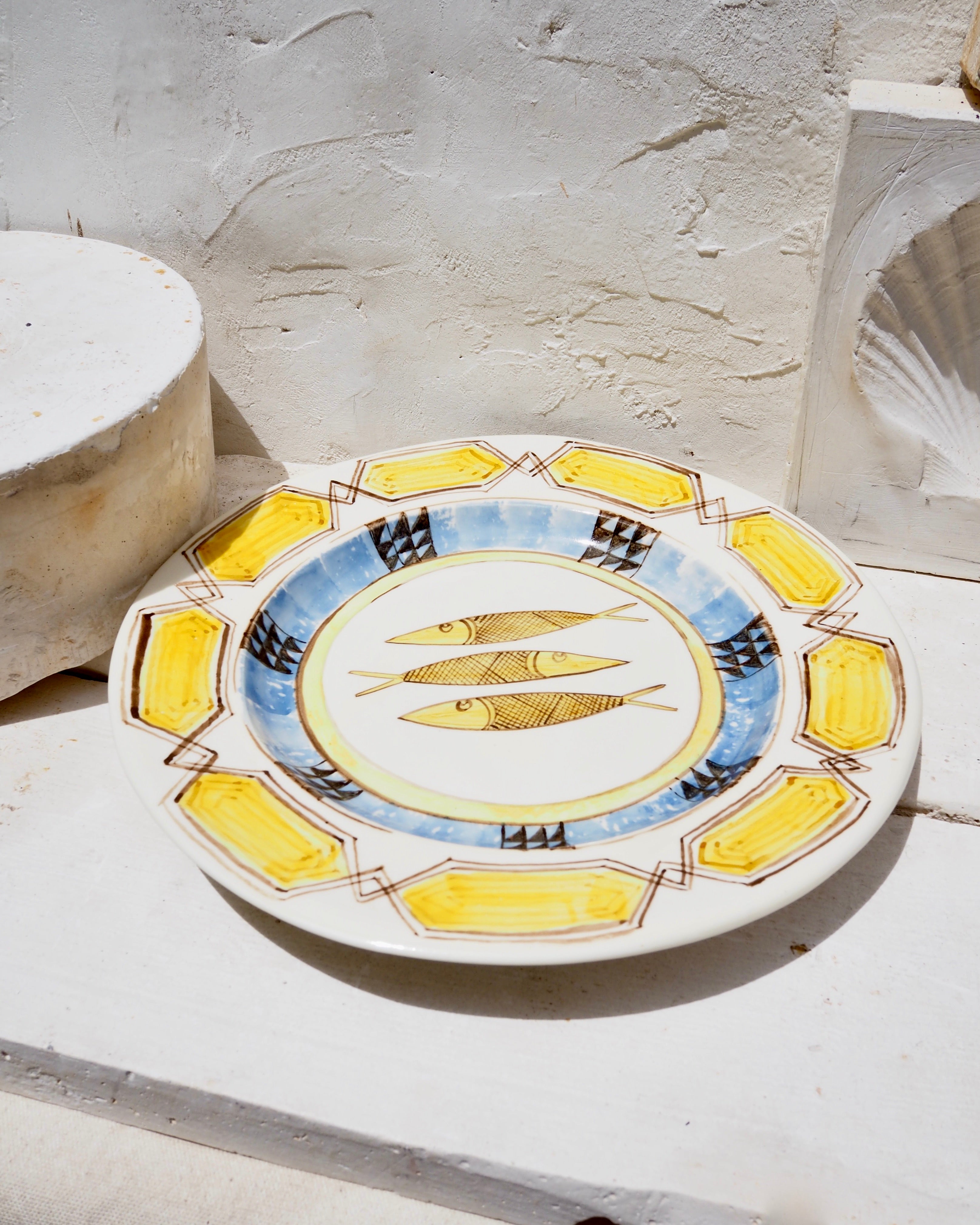 Plate with yellow tile border