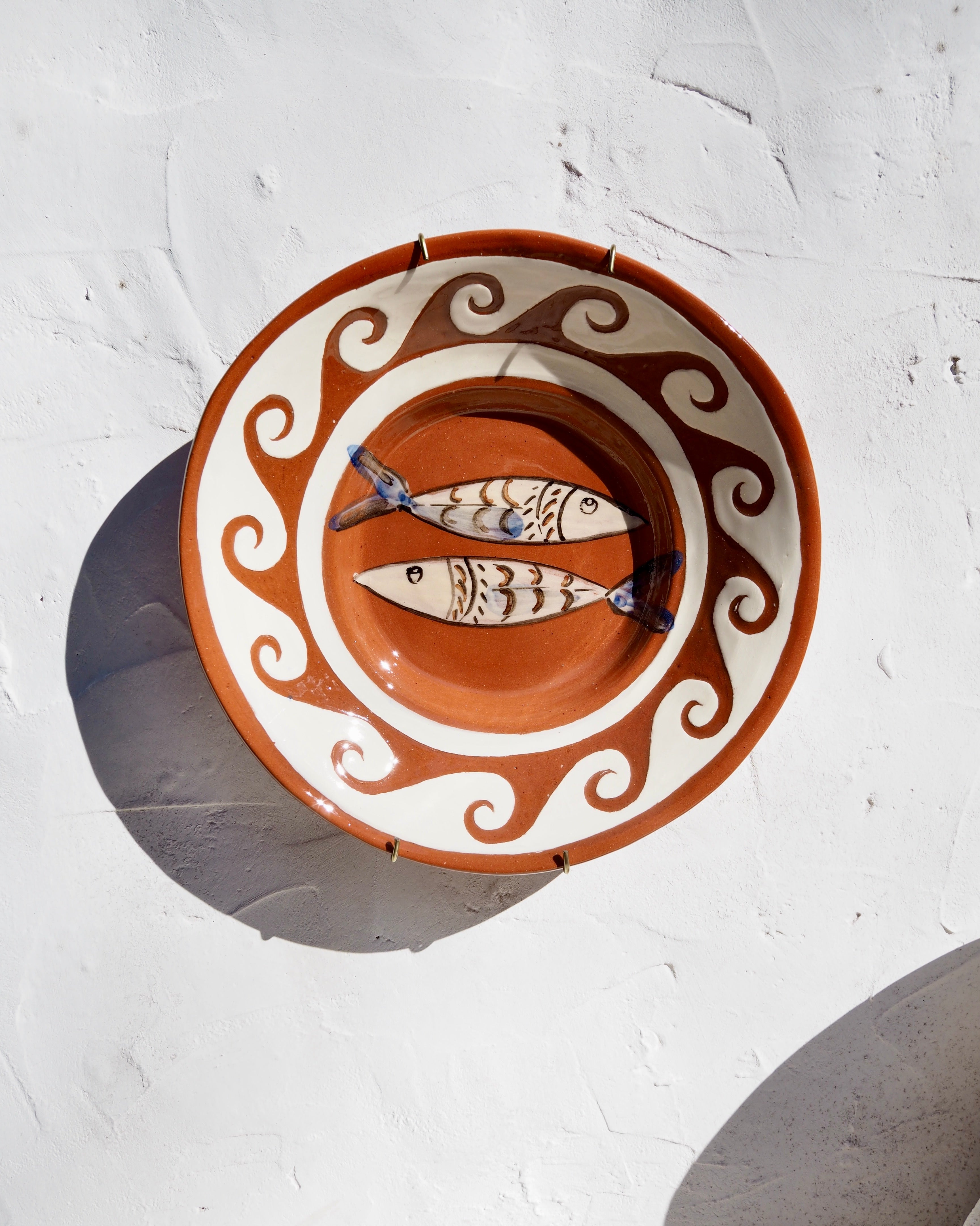 Puglia Plate - Carved border detail with fish and brass wall hook